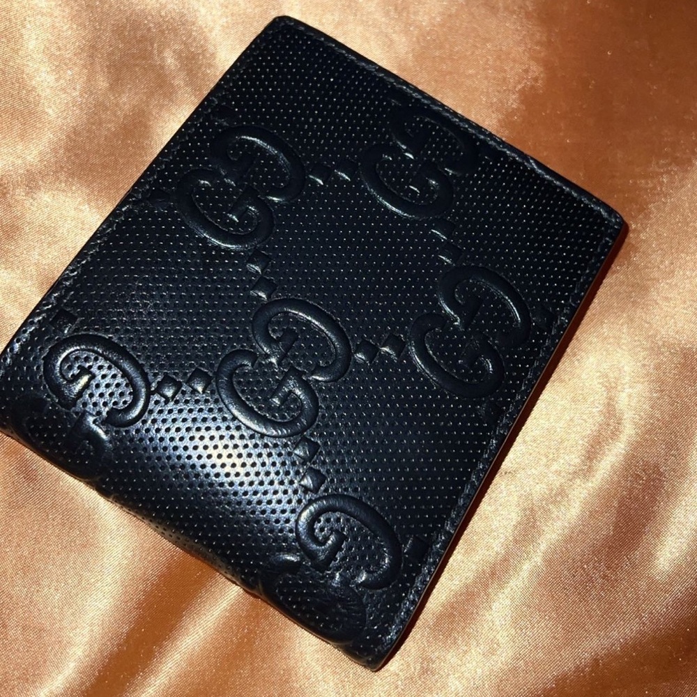 GUCCI Embossed Bi-fold Wallet